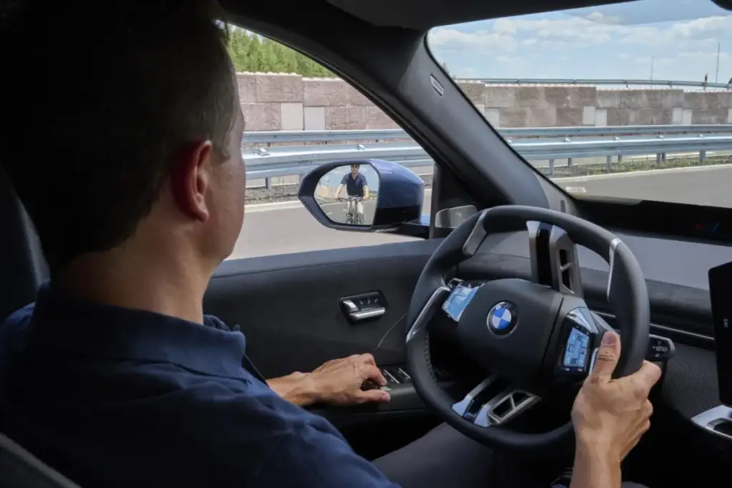 BMW Neue Klasse Can Stop You Opening the Door Into a Cyclist